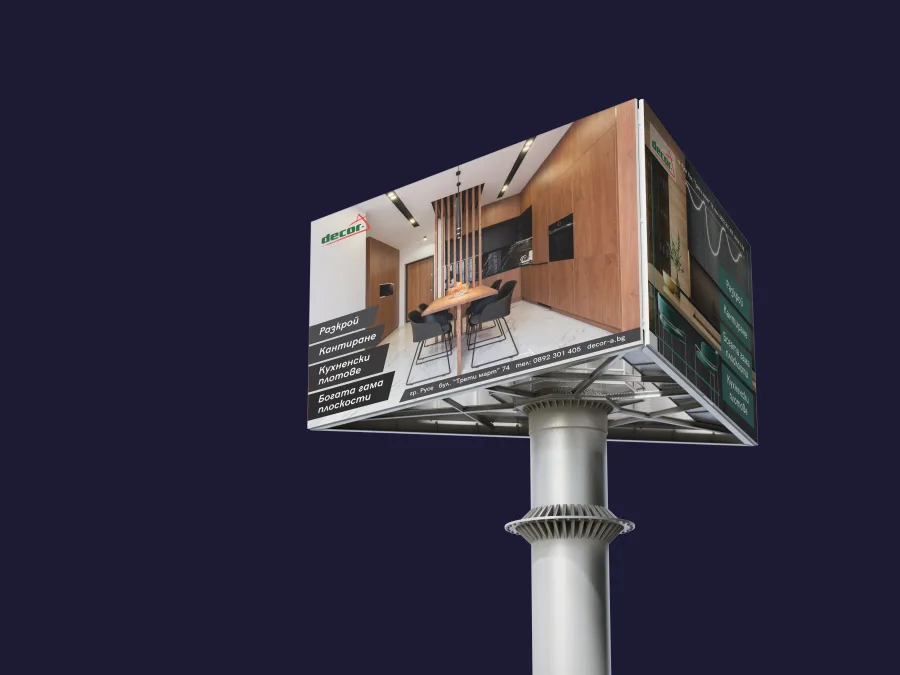 A three-sided billboard with both Dekor A designs: a dining room and a kitchen