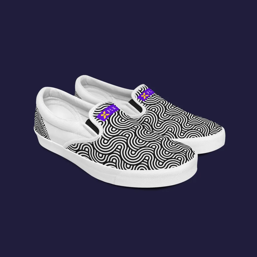 A pair of FLX shoes with a black-and-white pattern and a purple FLX tag