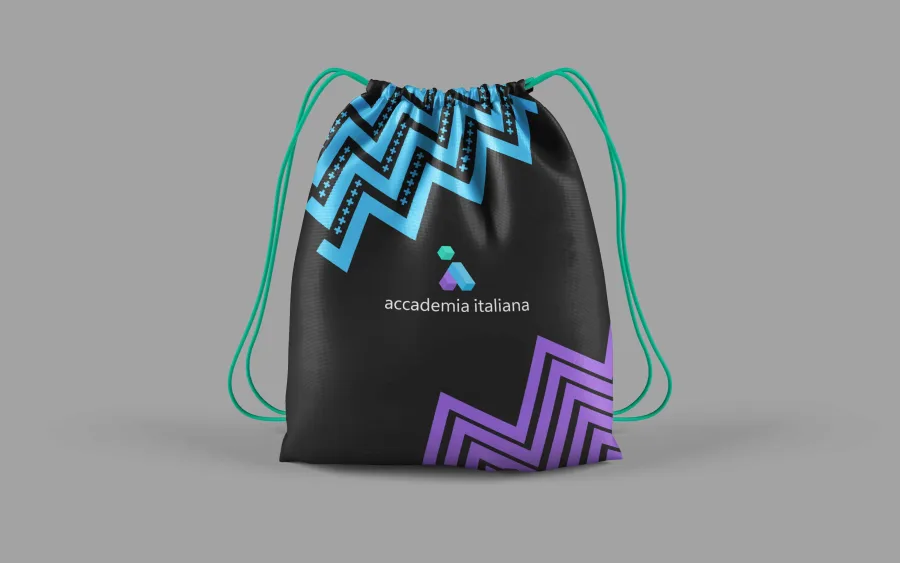 A black drawstring bag with the Accademia Italiana logo and blue and purple zigzags