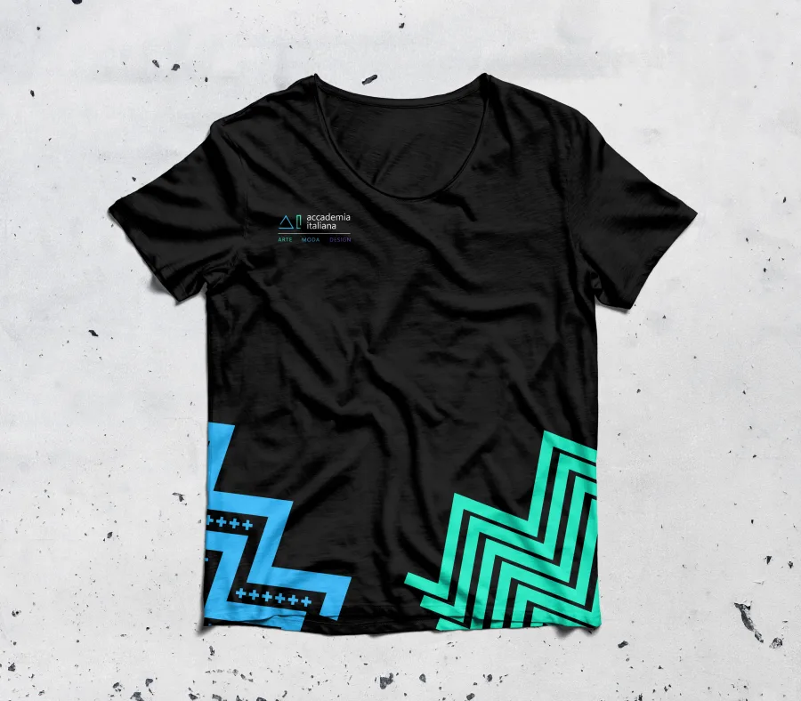 A black T-shirt with the line version of the Accademia Italiana logo and blue and turquoise zigzags