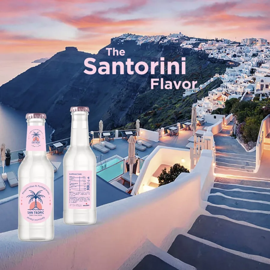 Advertising visual for the Santorini flavour: the bottles against the island at sunset