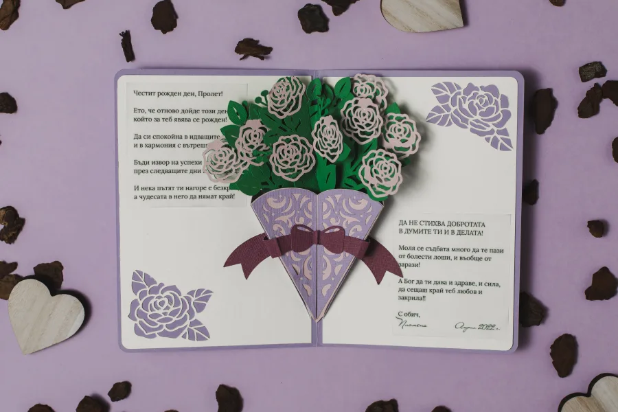A birthday card with a pop-up bouquet of paper roses